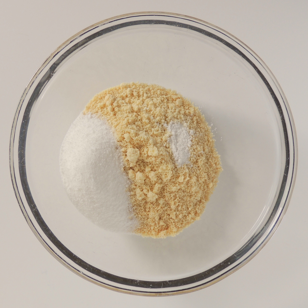 Mixing dry goods together for pumpkin keto cookies