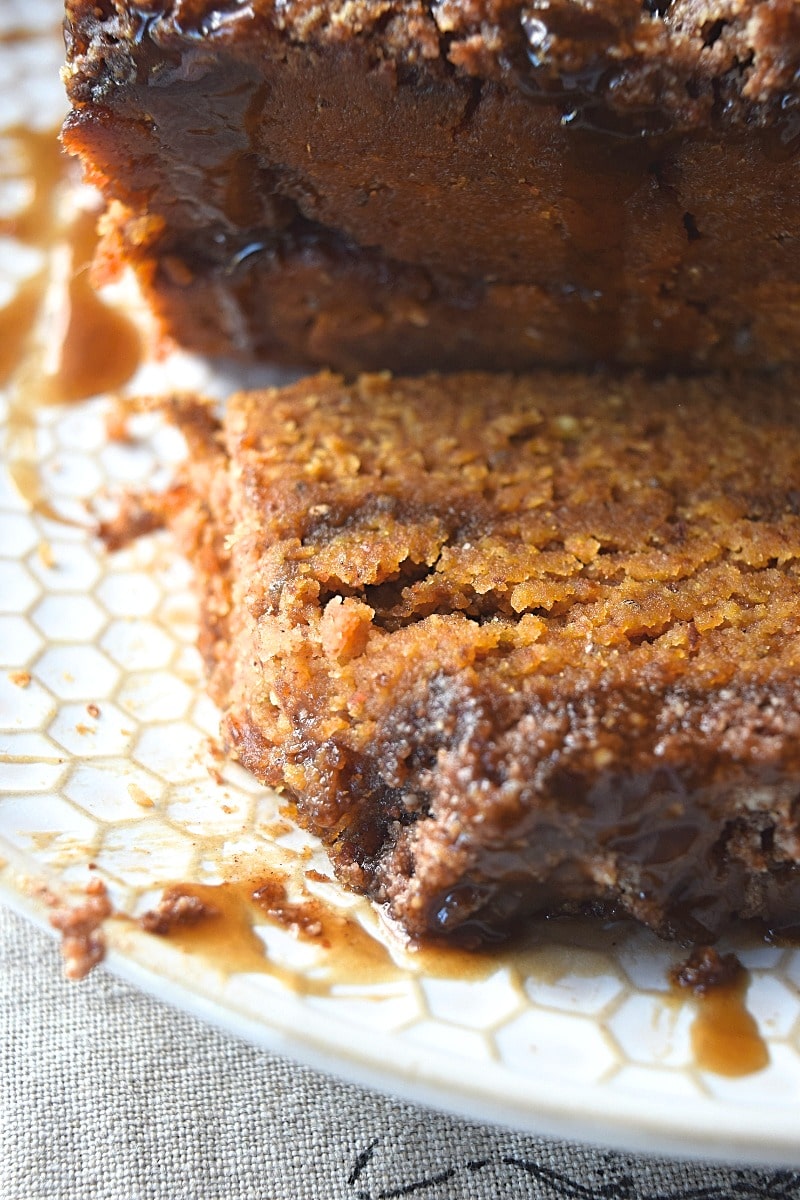 A cut piece of gluten free paleo pumpkin cake