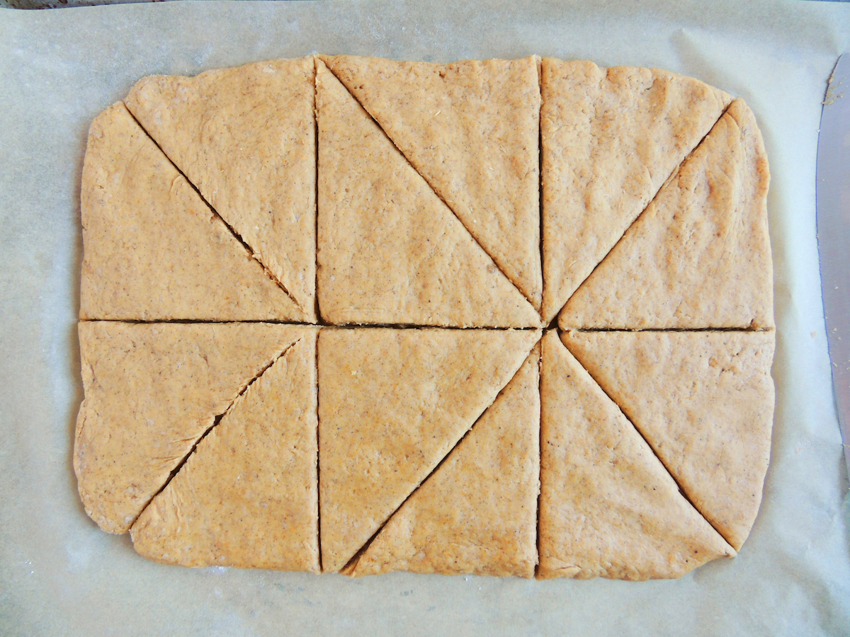Scored gluten free pumpkin scones.