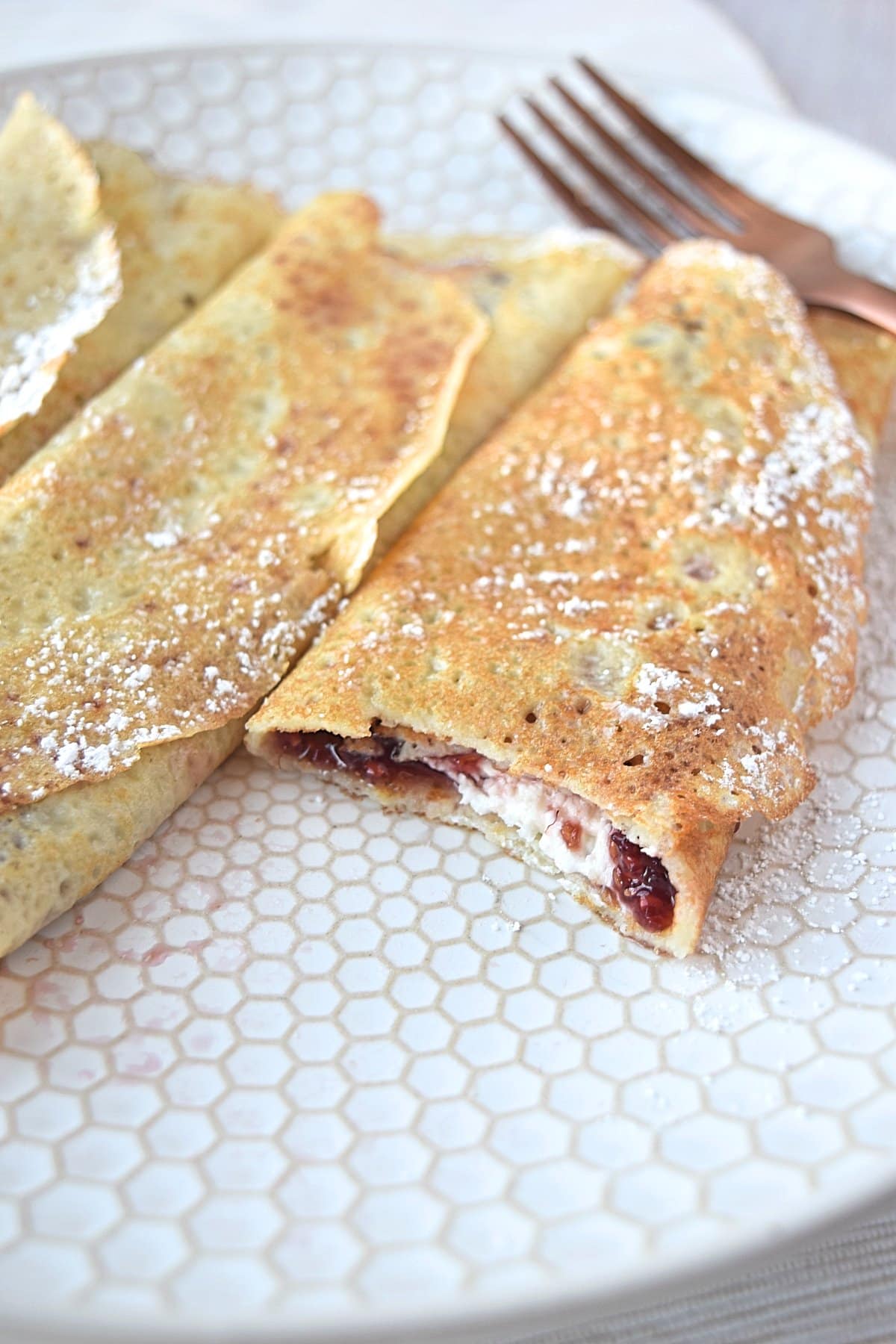 A bite taken out of the gluten free blintzes.