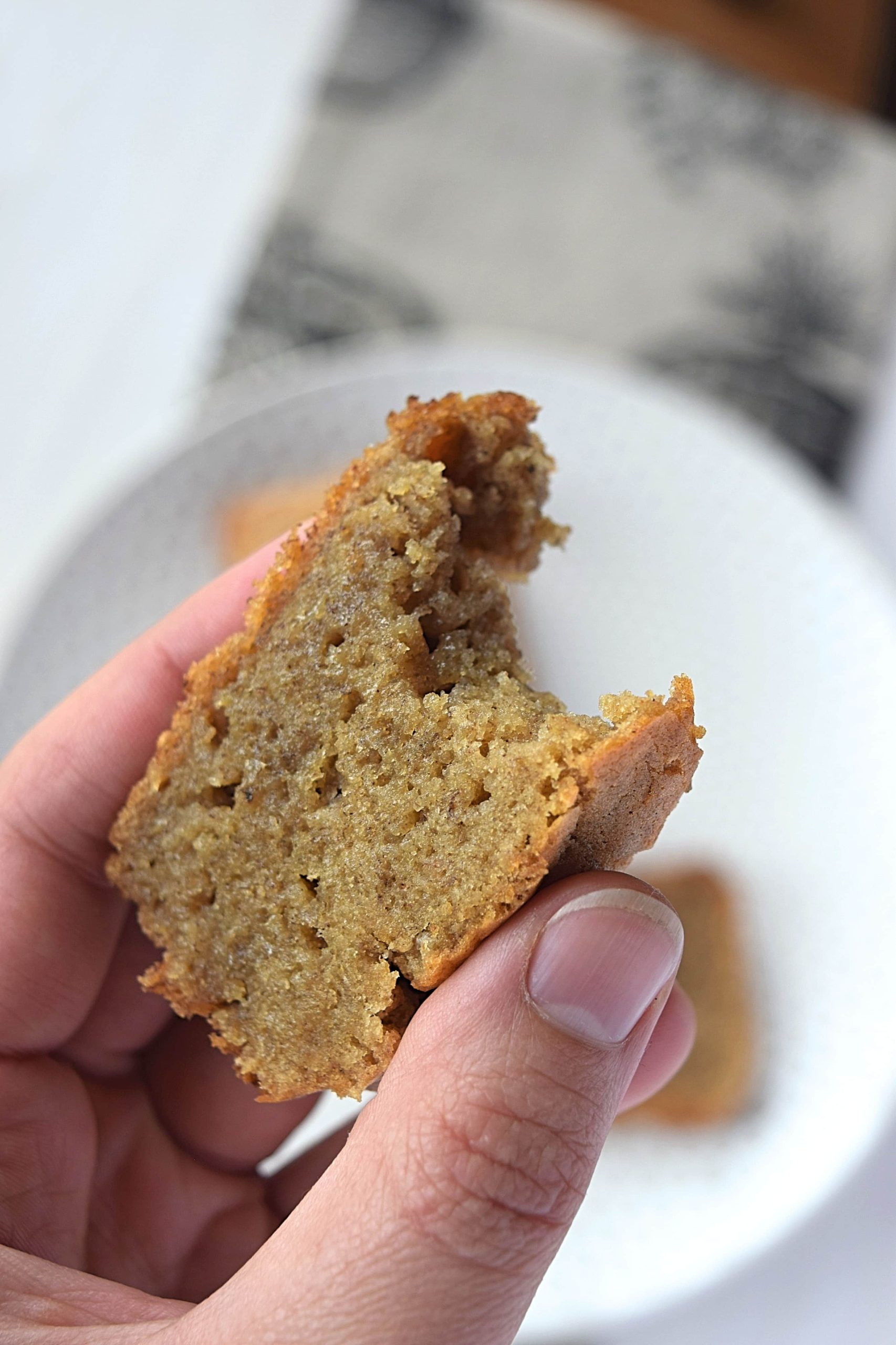A piece of banana bread with a bite out of it