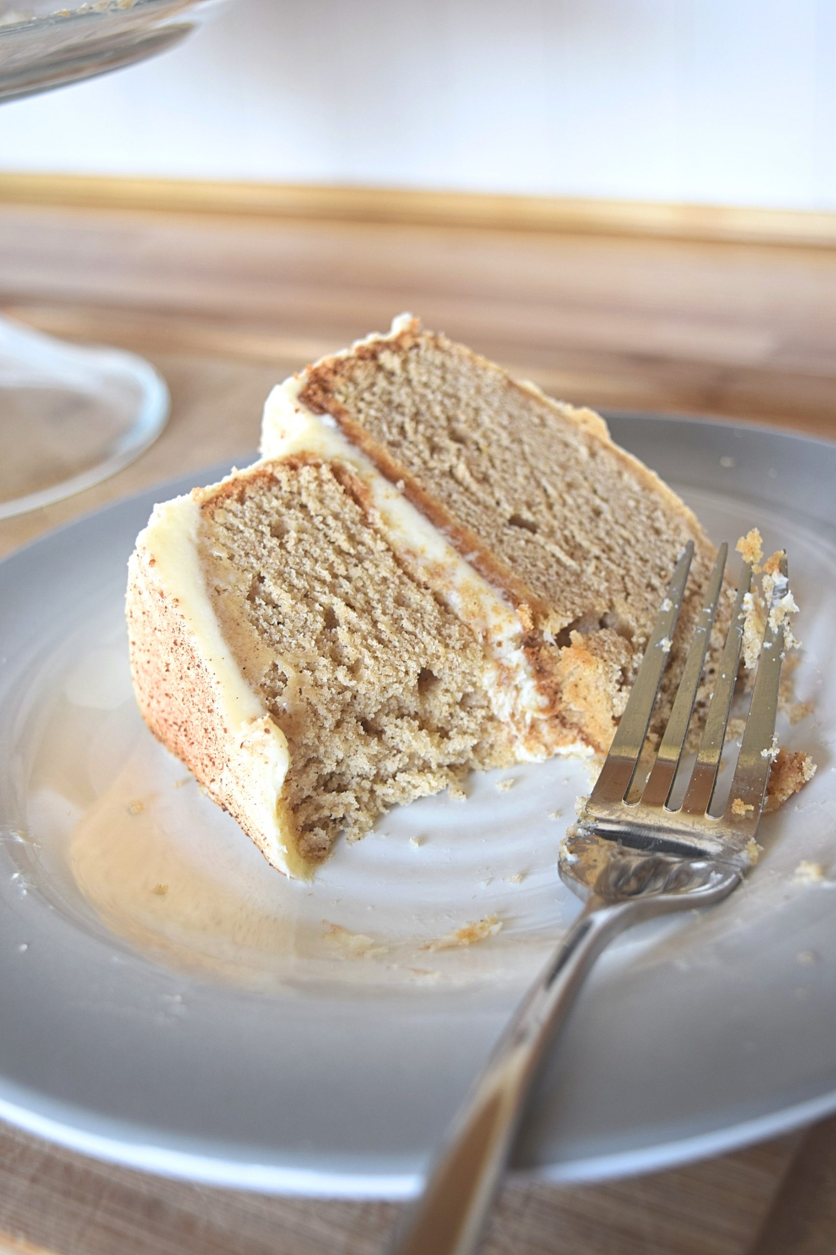 Gluten free spice cake with a piece missing from it