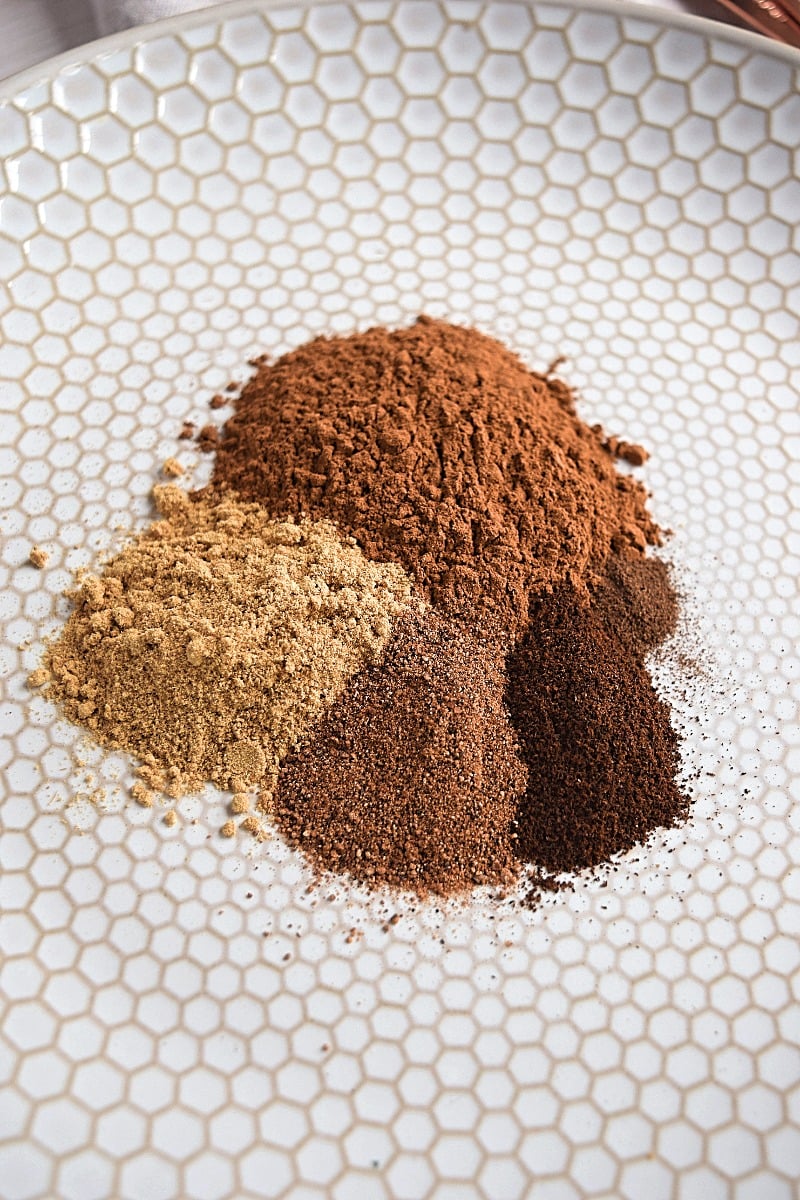 Piles of spices not yet mixed together, pre-pumpkin spice mix