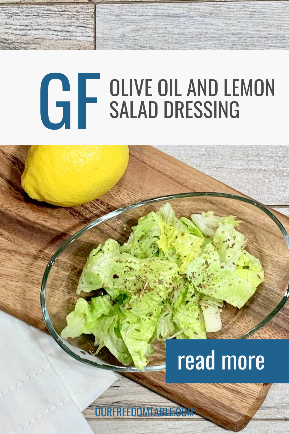Pin image for olive oil and lemon salad dressing blog post - features salad beside a lemon on a wood board.