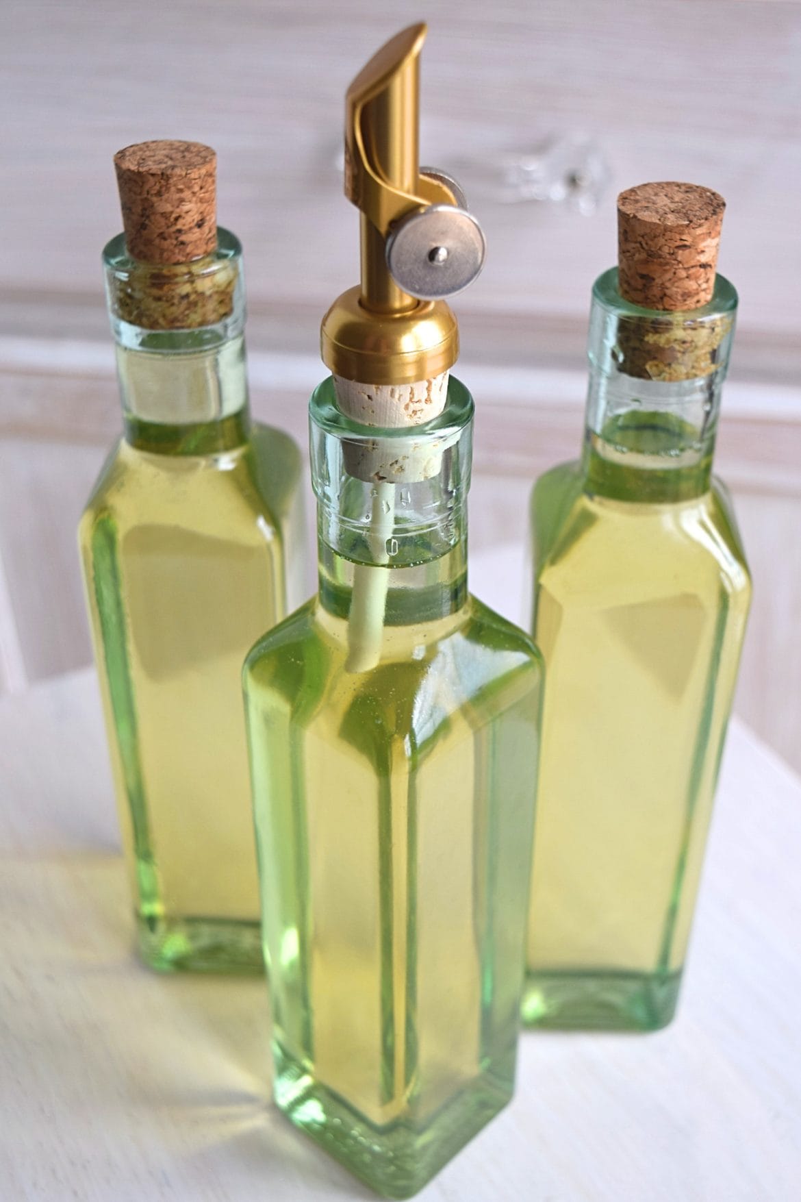 Bottles of onion oil sitting together