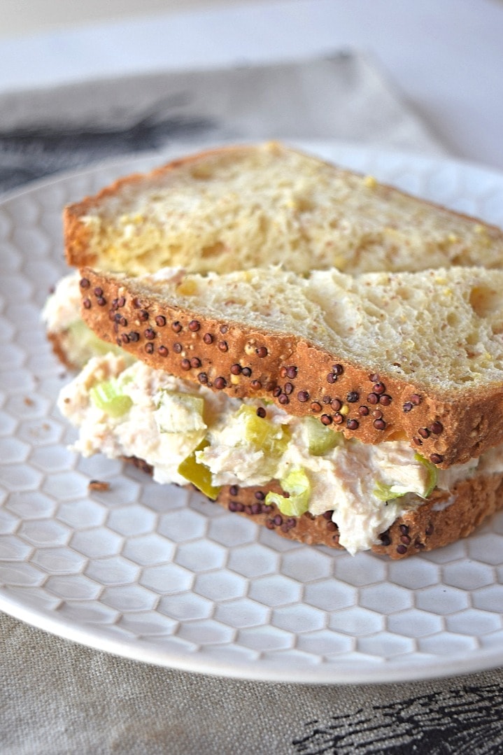Tuna fish sandwich close up on a white plate