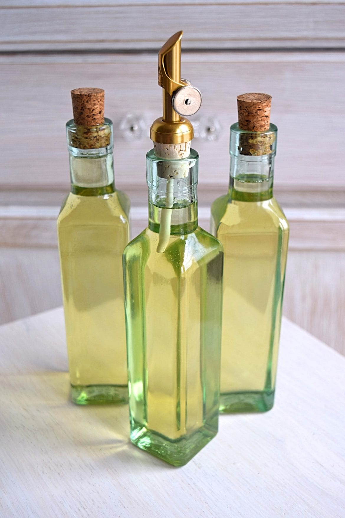 trio of onion oil bottles