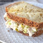 Tuna fish sandwich close up on a white plate